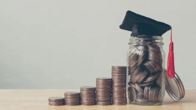 student debt coin stacks
